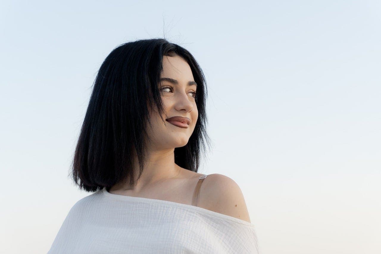 Portrait of a woman with a sleek bob haircut